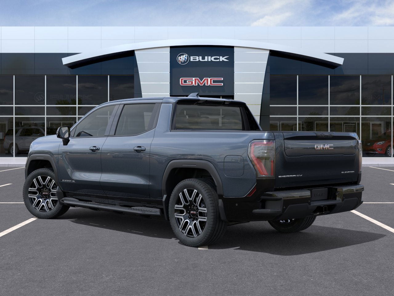 2026 GMC Sierra EV — rear three-quarter view